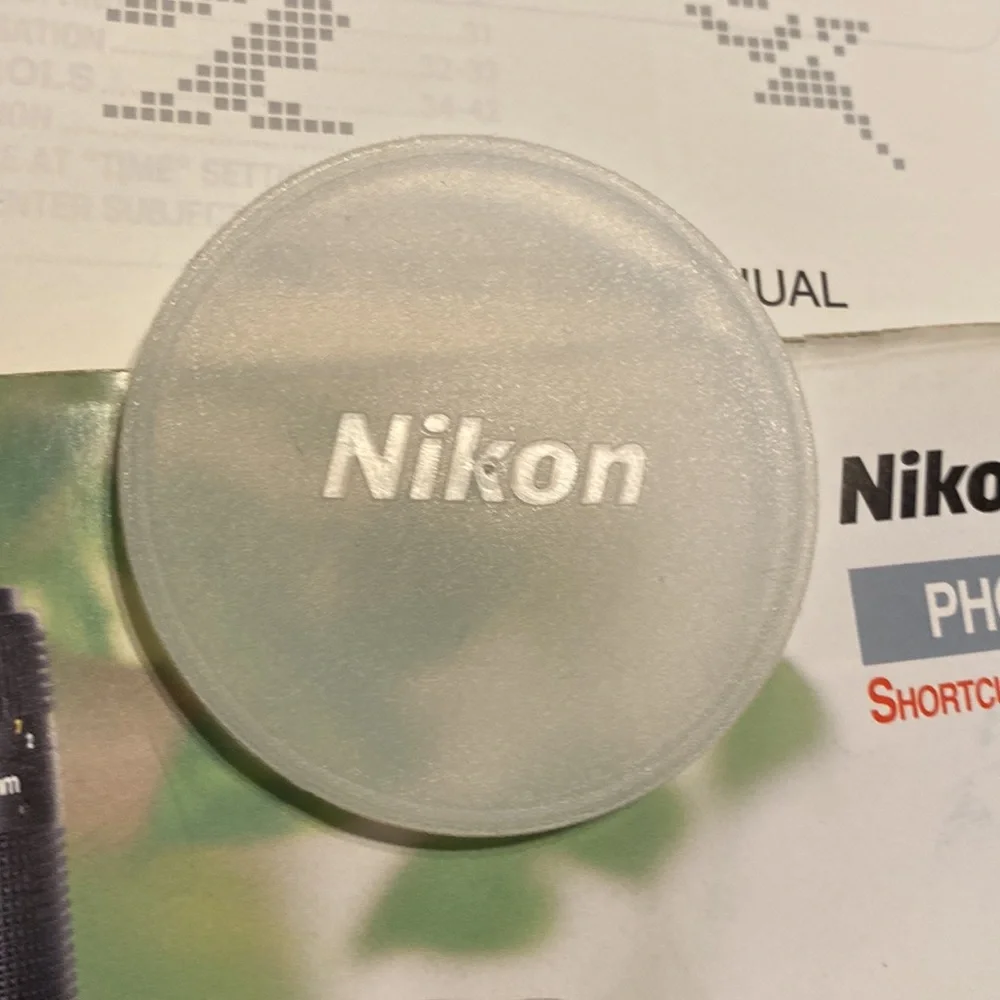 Vintage retro Nikon camera N50 strap and lens cover 1994 accessories